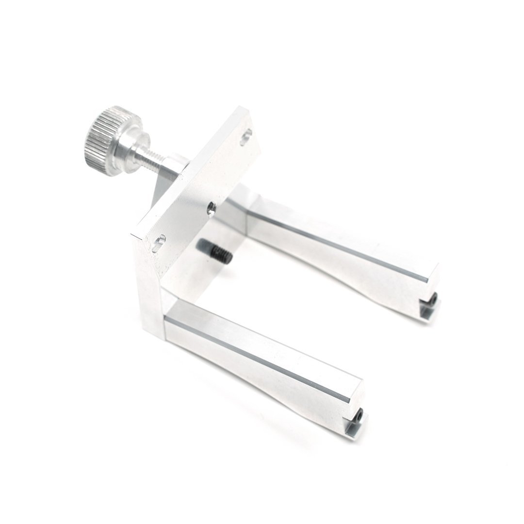TSPROF Blitz and Blitz 360 Scissor Clamp is silver in colour and has a main screw for attaching the scissors safley