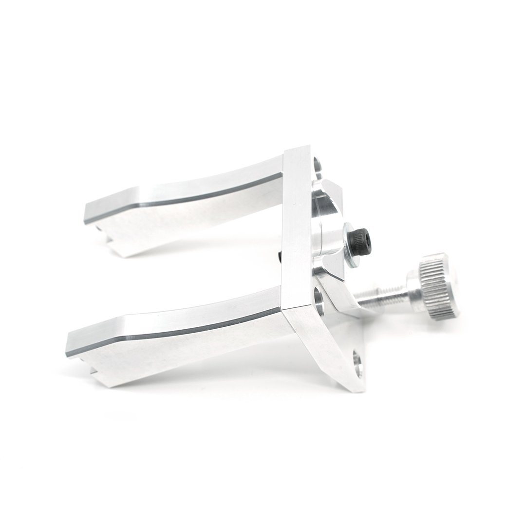 TSPROF Blitz and Blitz 360 Scissor Clamp is silver in colour and has a main screw for attaching the scissors safley